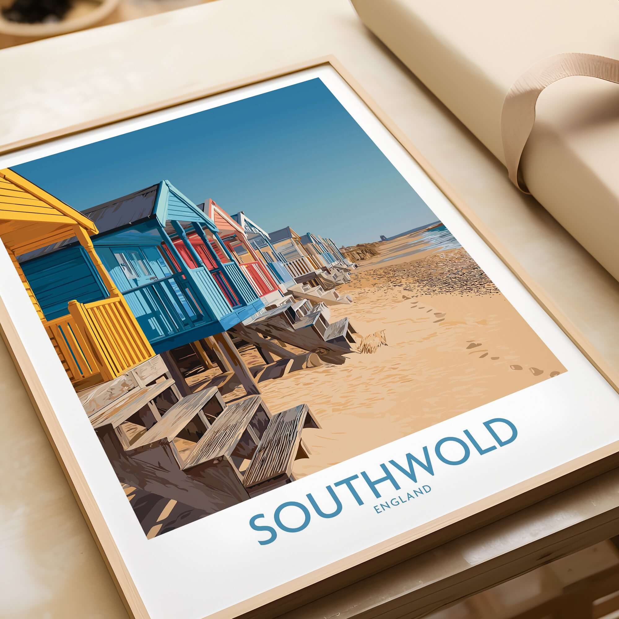 Southwold England Travel Poster featuring colorful beach huts on the sandy coastline.