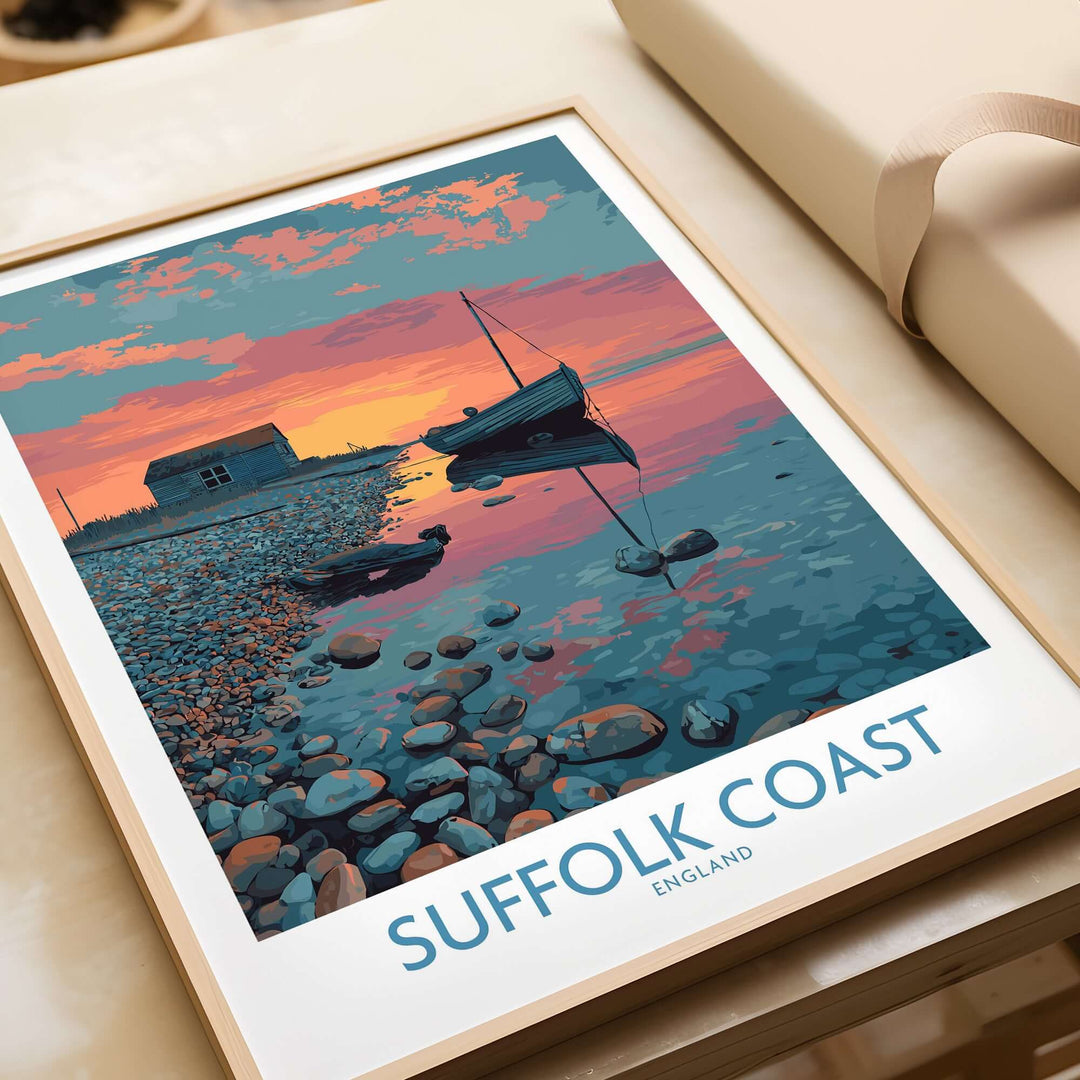 Suffolk Coast poster showcasing a tranquil evening seascape with sunset hues and a boat, ideal for UK travel decor.