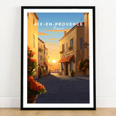 Aix-en-Provence Poster in a black wooden frame leaning against a white wall on a light wooden floor