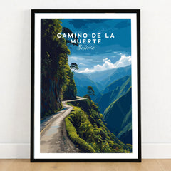 Camino de la Muerte Poster Bolivia Wall Art in a black wooden frame leaning against a white wall on a light wooden floor