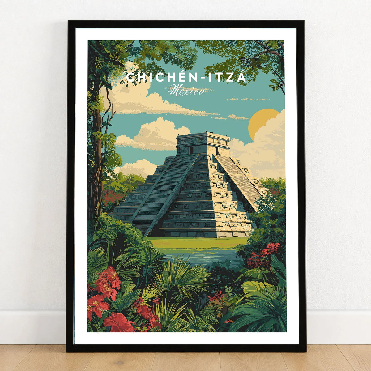 Chichén Itzá Mexico Travel Poster Pyramid Jungle Print Mayan Ruins Wall Art Decor in a black wooden frame leaning against a white wall on a light wooden floor