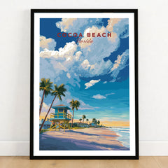 Cocoa Beach Lifeguard Tower Poster - Palm Tree Beach Wall Art in a black wooden frame leaning against a white wall on a light wooden floor