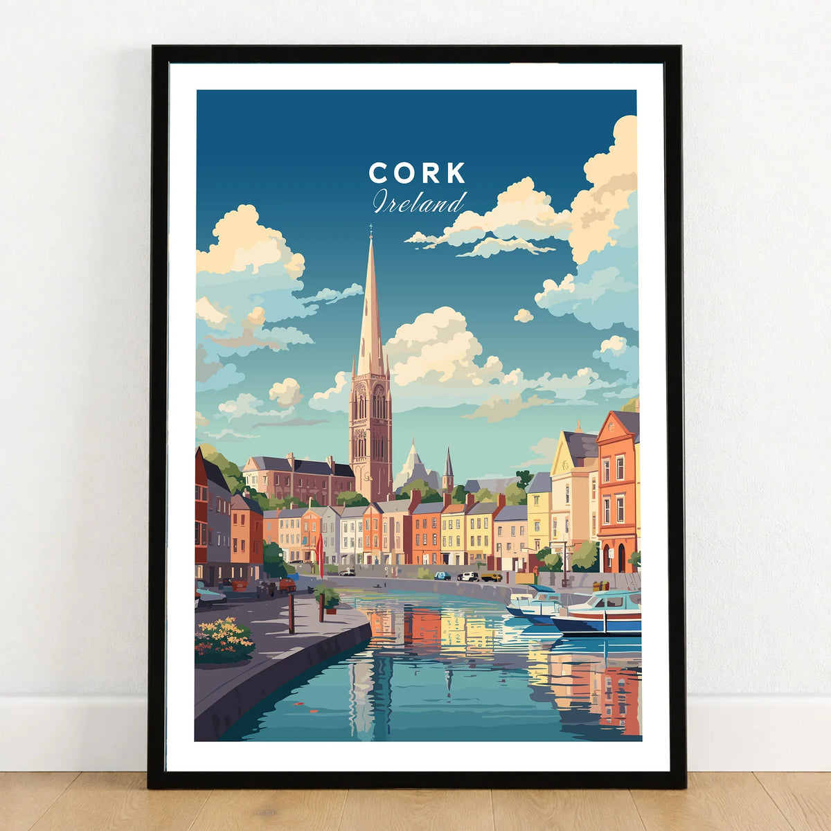 Cork City Ireland Print in a black wooden frame leaning against a white wall on a light wooden floor
