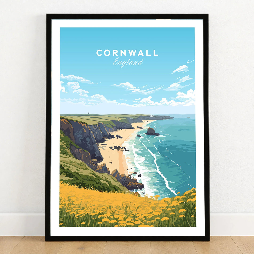 Cornwall Poster in a black wooden frame leaning against a white wall on a light wooden floor