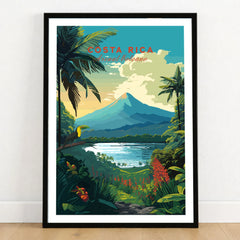 Costa Rica Print in a black wooden frame leaning against a white wall on a light wooden floor