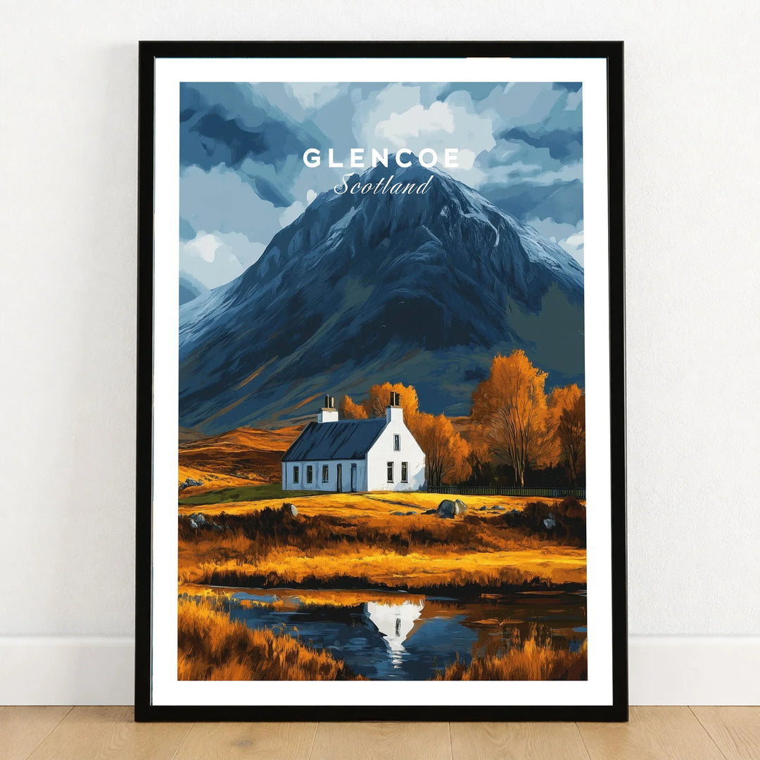 Glencoe Scotland Poster in a black wooden frame leaning against a white wall on a light wooden floor