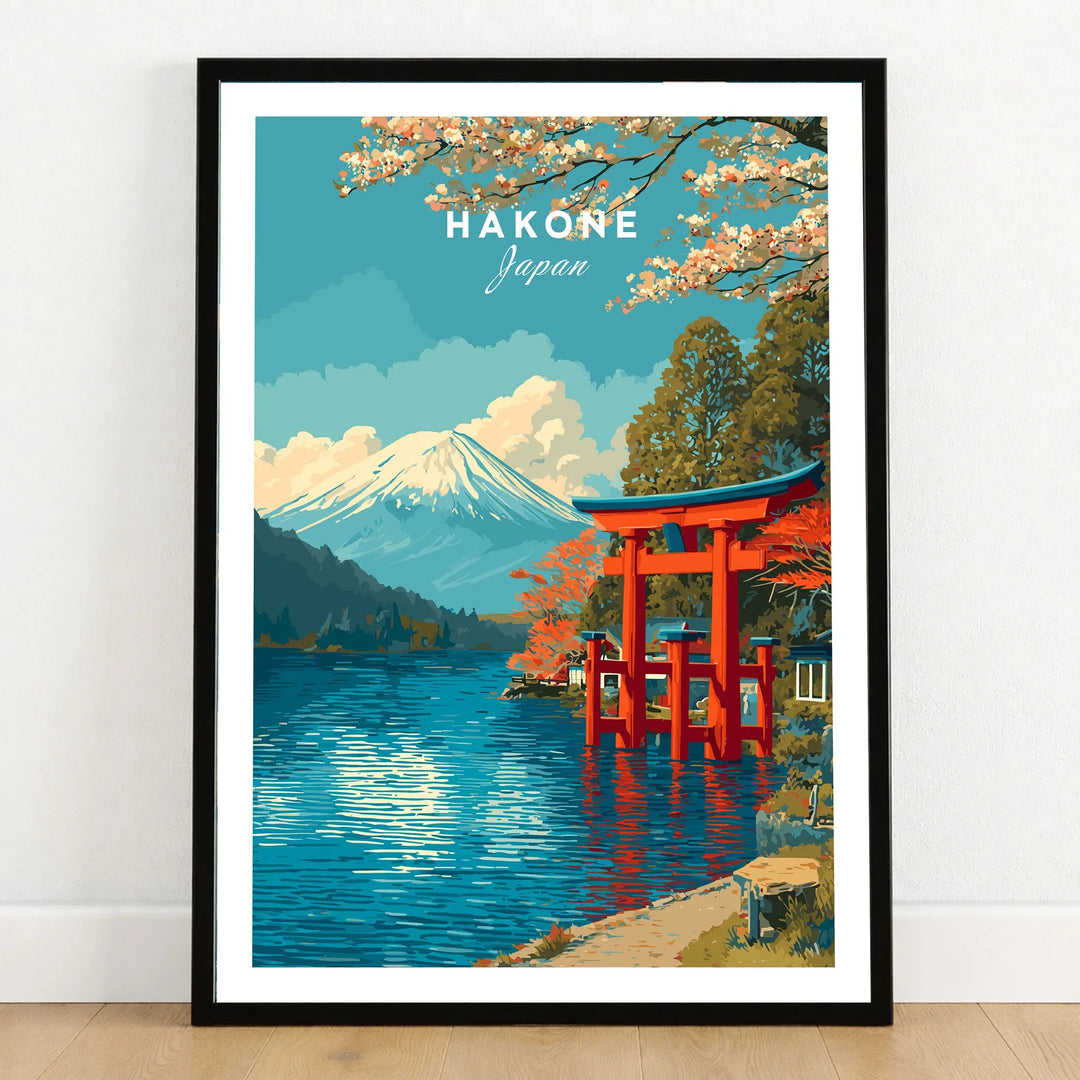 HakonePrint Japan Peace Shrine Torii Artwork - Mount Fuji Lake Ashi Poster in a black wooden frame leaning against a white wall on a light wooden floor