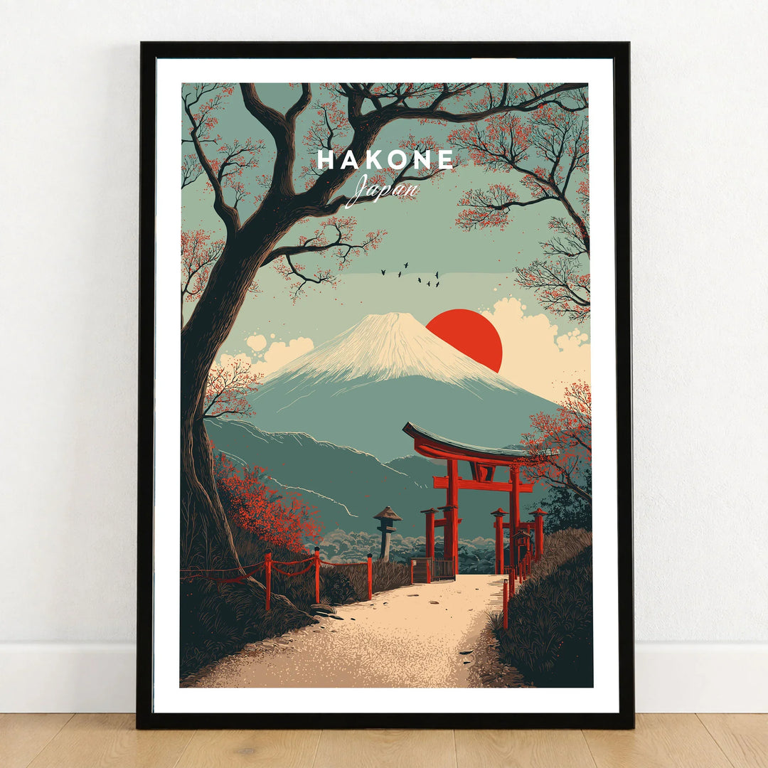 Hakone Japan Torii Gate Mount Fuji Print - Iconic Japanese Poster in a black wooden frame leaning against a white wall on a light wooden floor