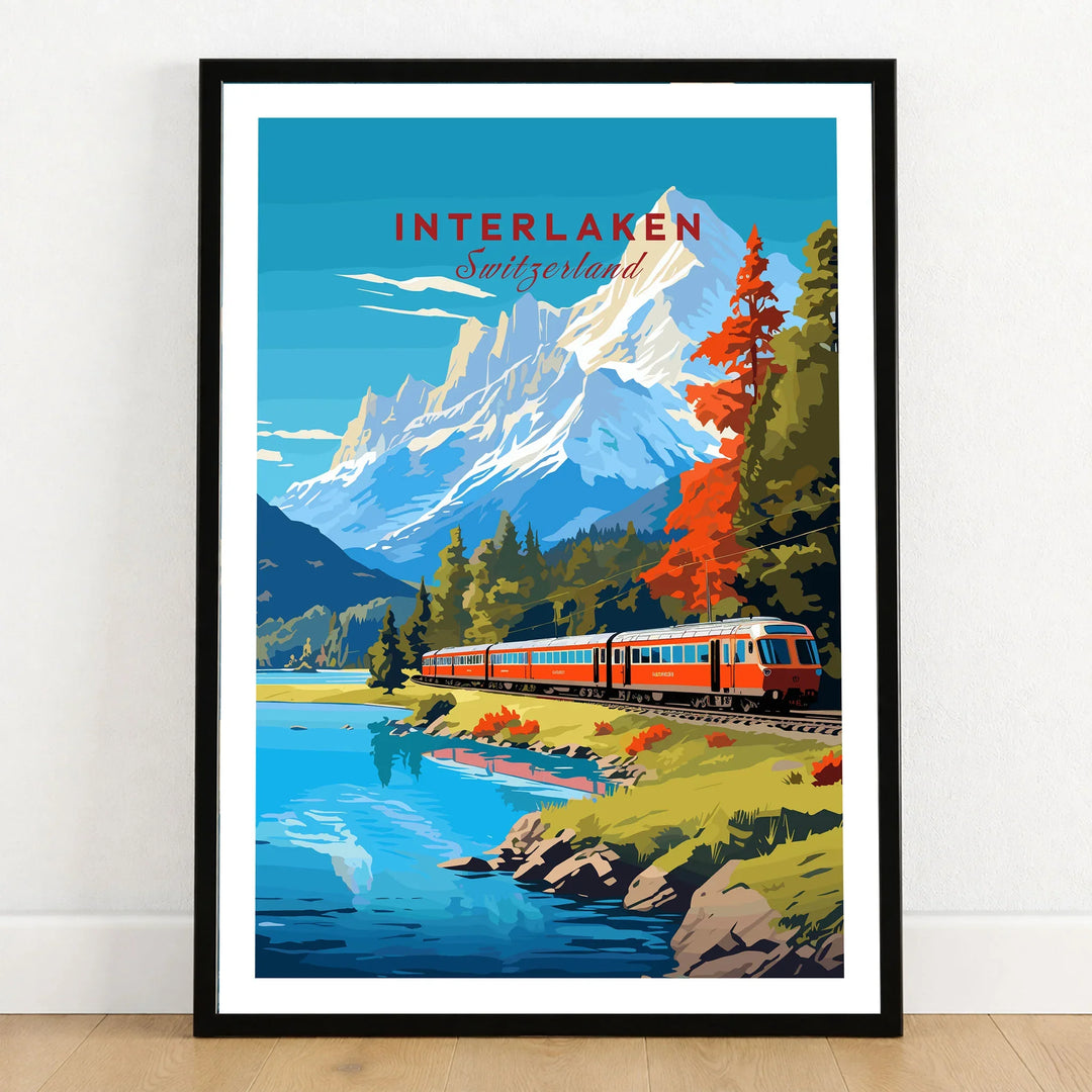 Interlaken Print Switzerland in a black wooden frame leaning against a white wall on a light wooden floor