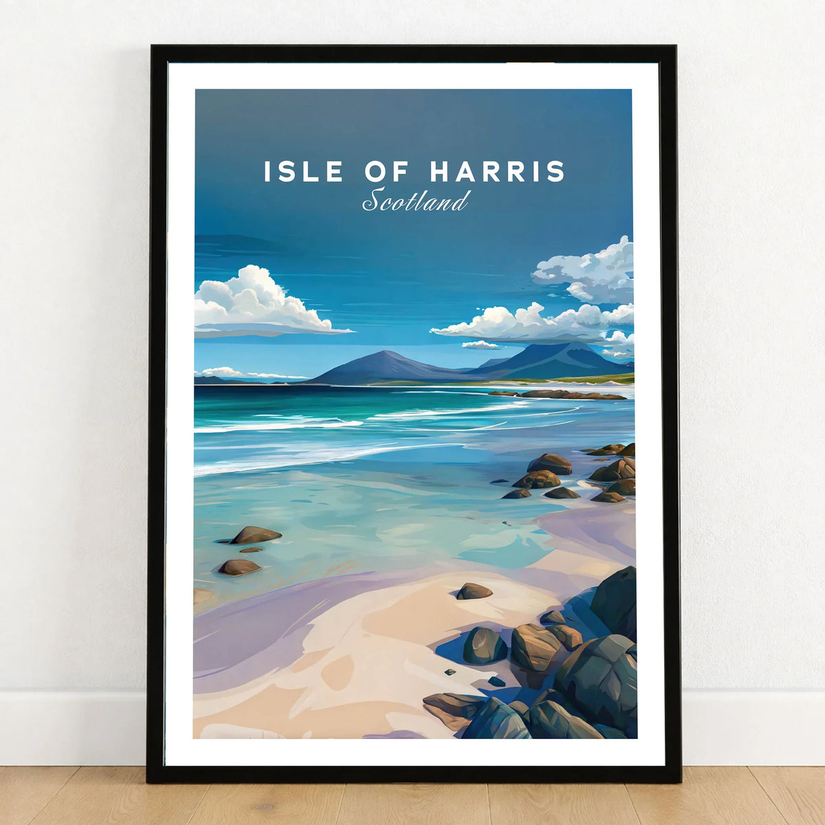 Isle of Harris Scotland Blue Sky Beach Print - Rocky Coastline Wall Art in a black wooden frame leaning against a white wall on a light wooden floor