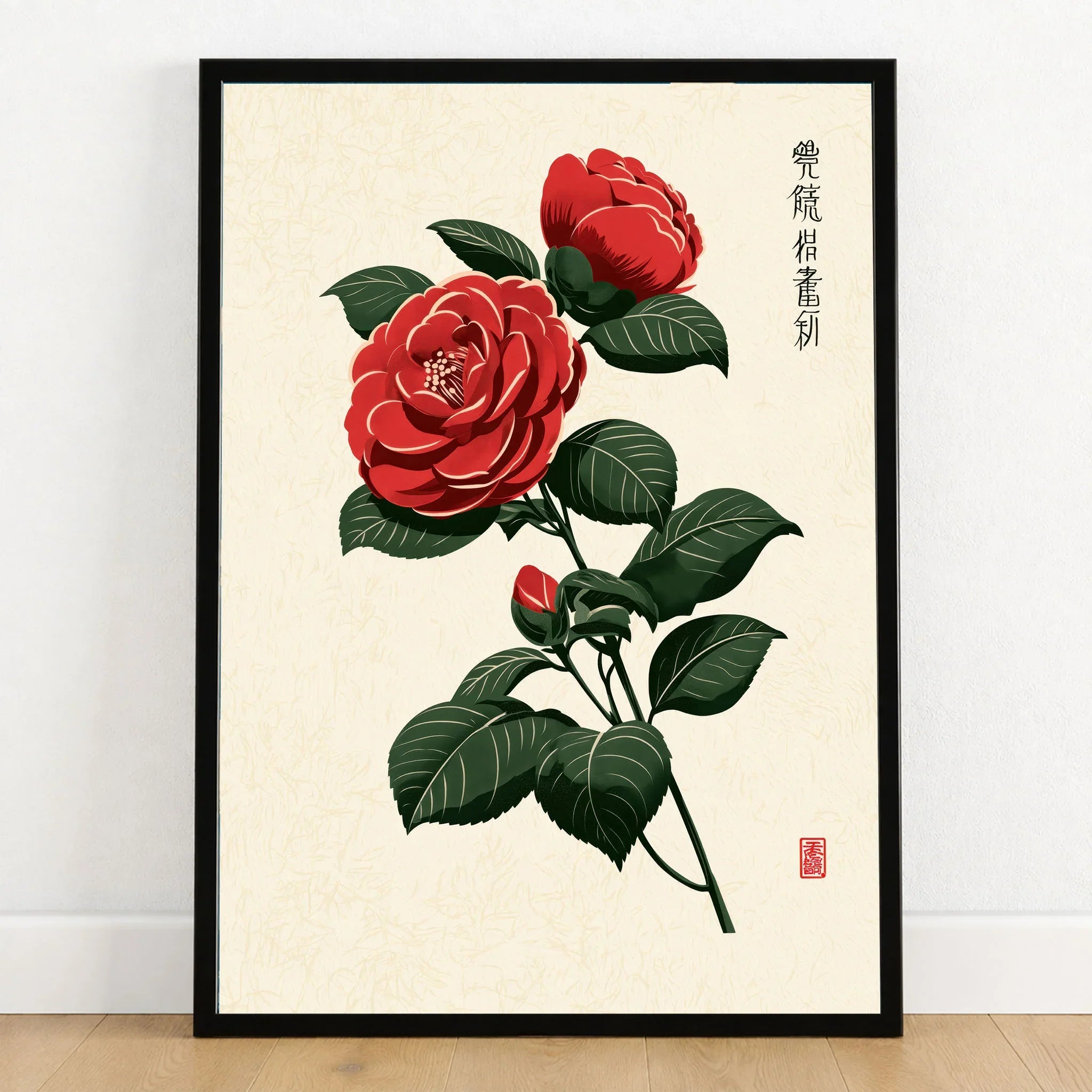 Red Camellia Art Print – Japanese Botanical Wall Art — art print in black frame on wooden floor