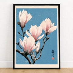 Pink Magnolia Art Print – Blue Japanese Botanical Wall Art — art print in black frame on wooden floor