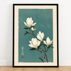 White Magnolia Art Print – Teal Japanese Botanical Wall Art — art print in black frame on wooden floor