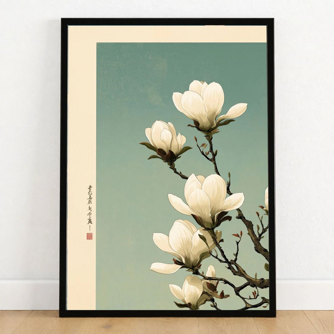 Magnolia Blossom Art Print – Soft Japanese Botanical Wall Art — art print in black frame on wooden floor