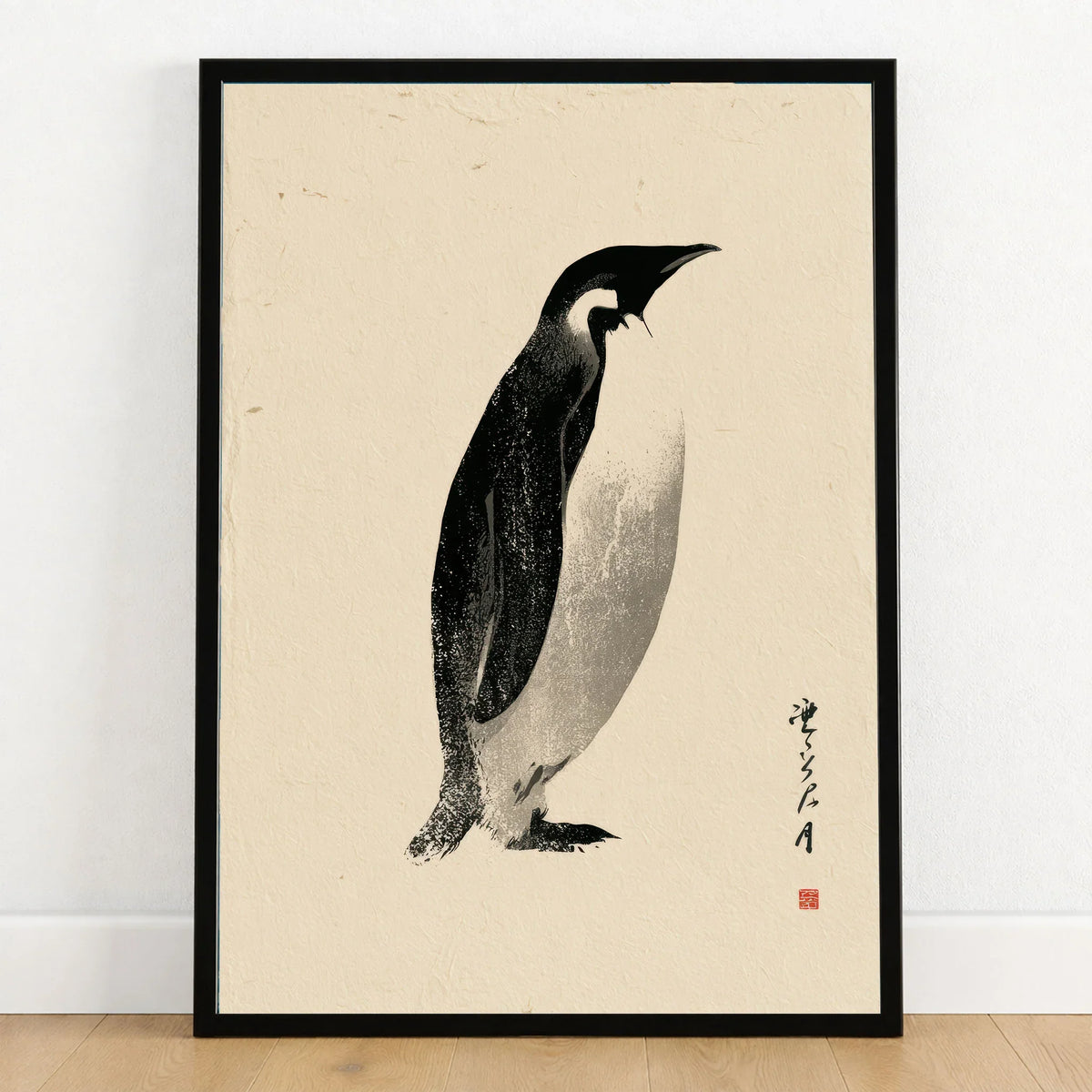 Emperor Penguin Wall Art – Vintage Japanese Ink Print — art print in black frame on wooden floor
