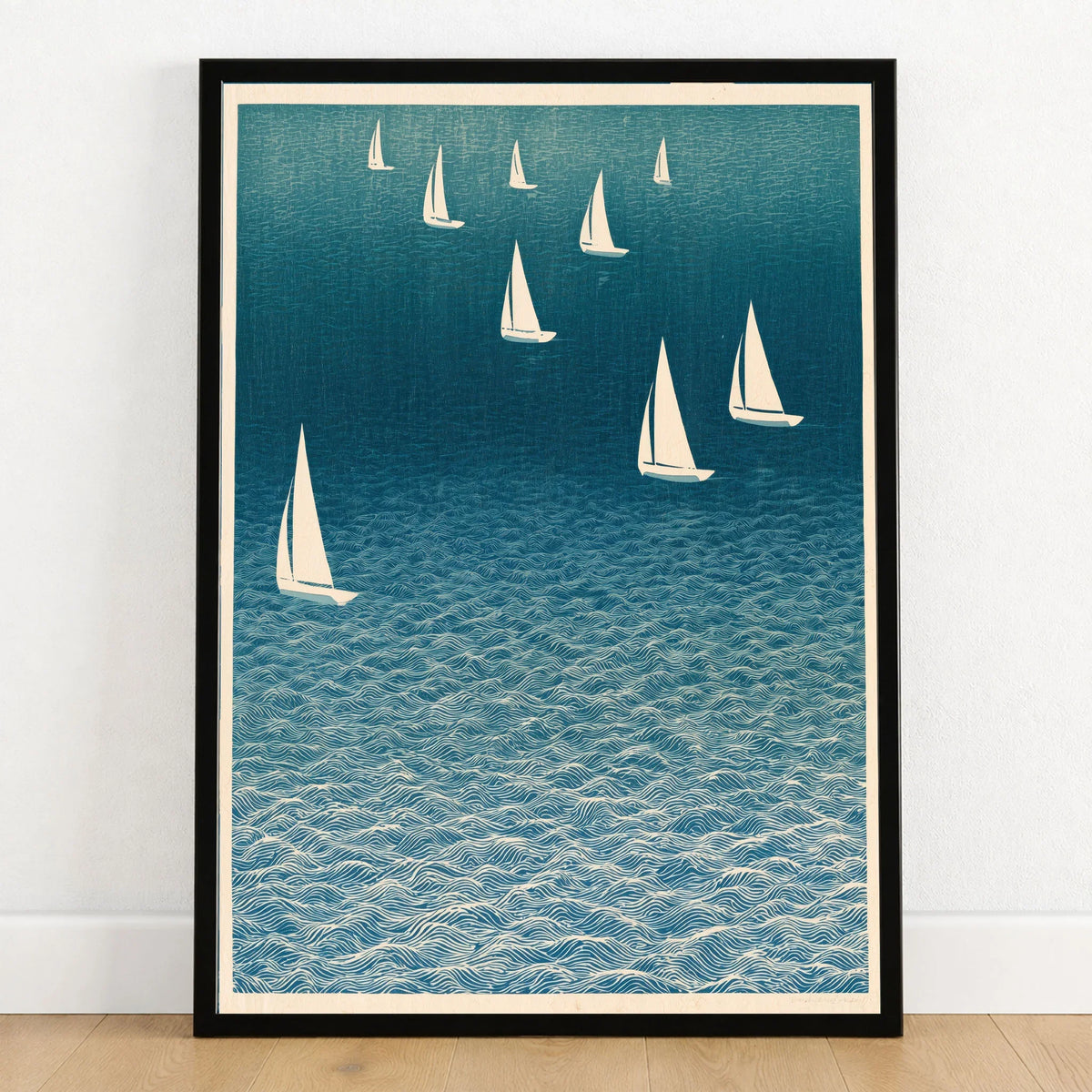 Sailing Boats Art Print – Blue Japanese Coastal Wall Art — art print in black frame on wooden floor