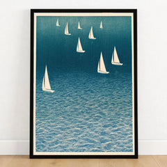 Sailing Boats Art Print – Blue Japanese Coastal Wall Art — art print in black frame on wooden floor