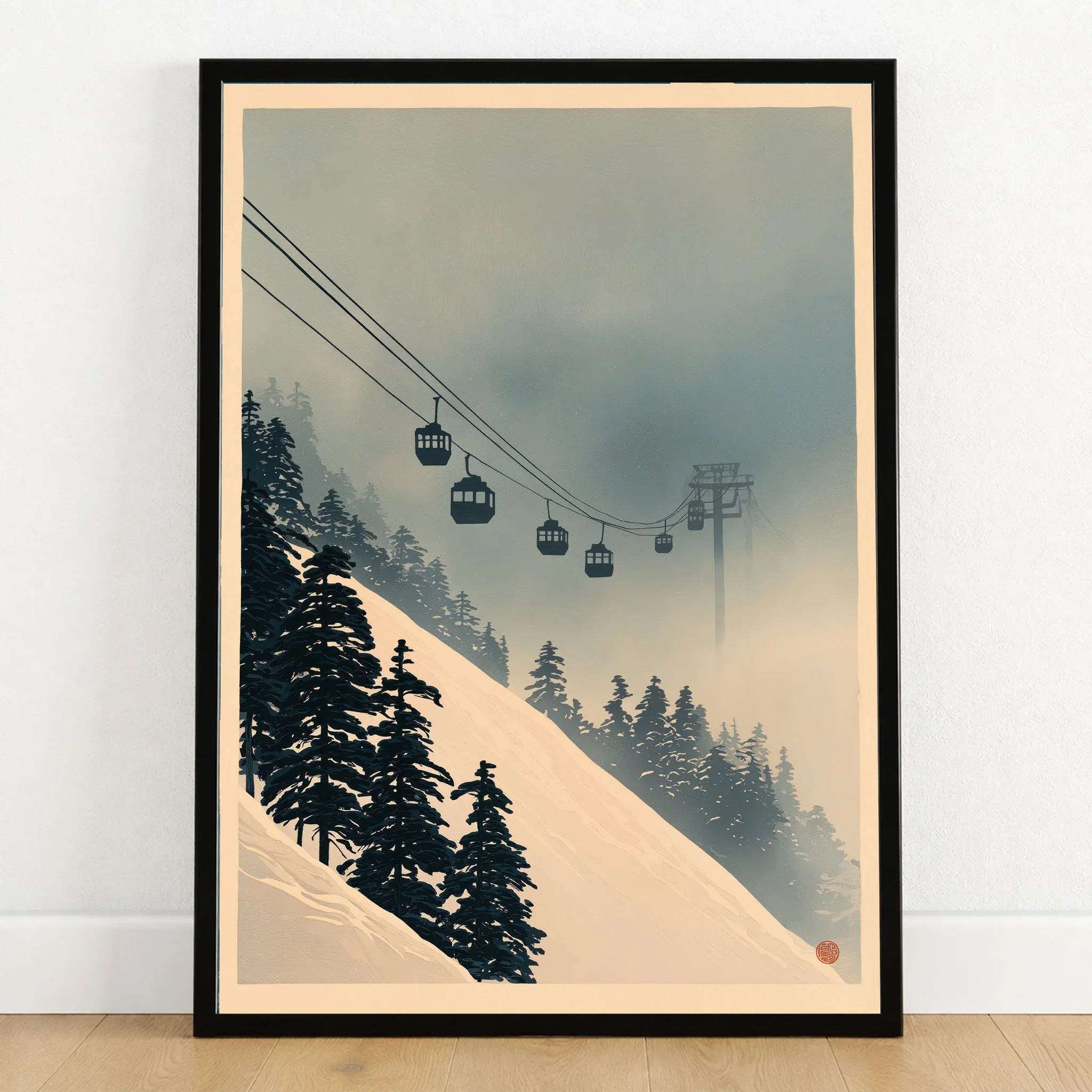 Misty Ski Lift Art Print – Vintage Alpine Gondola Wall Art — art print in black frame on wooden floor