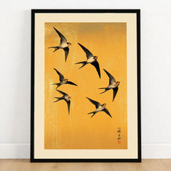 Swallows Art Print – Gold Japanese Bird Wall Art — art print in black frame on wooden floor
