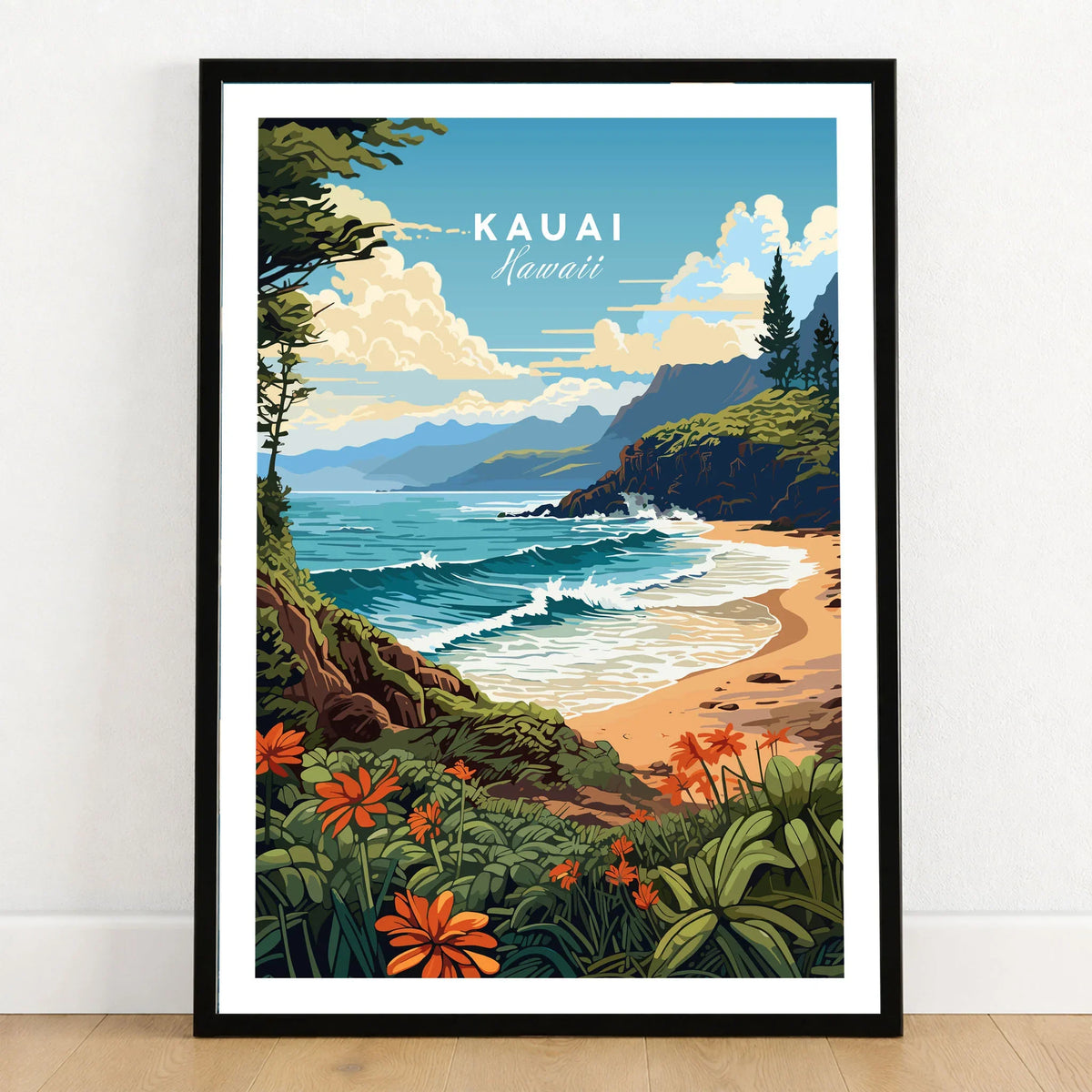 Kauai Print in a black wooden frame leaning against a white wall on a light wooden floor