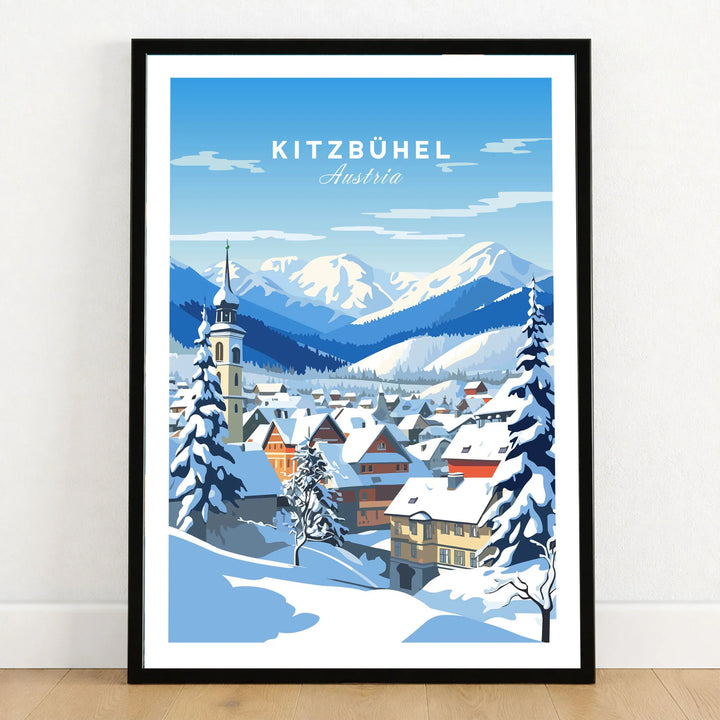 Kitzbuhel Poster in a black wooden frame leaning against a white wall on a light wooden floor