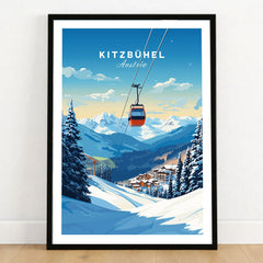 Kitzbuhel Art Print in a black wooden frame leaning against a white wall on a light wooden floor