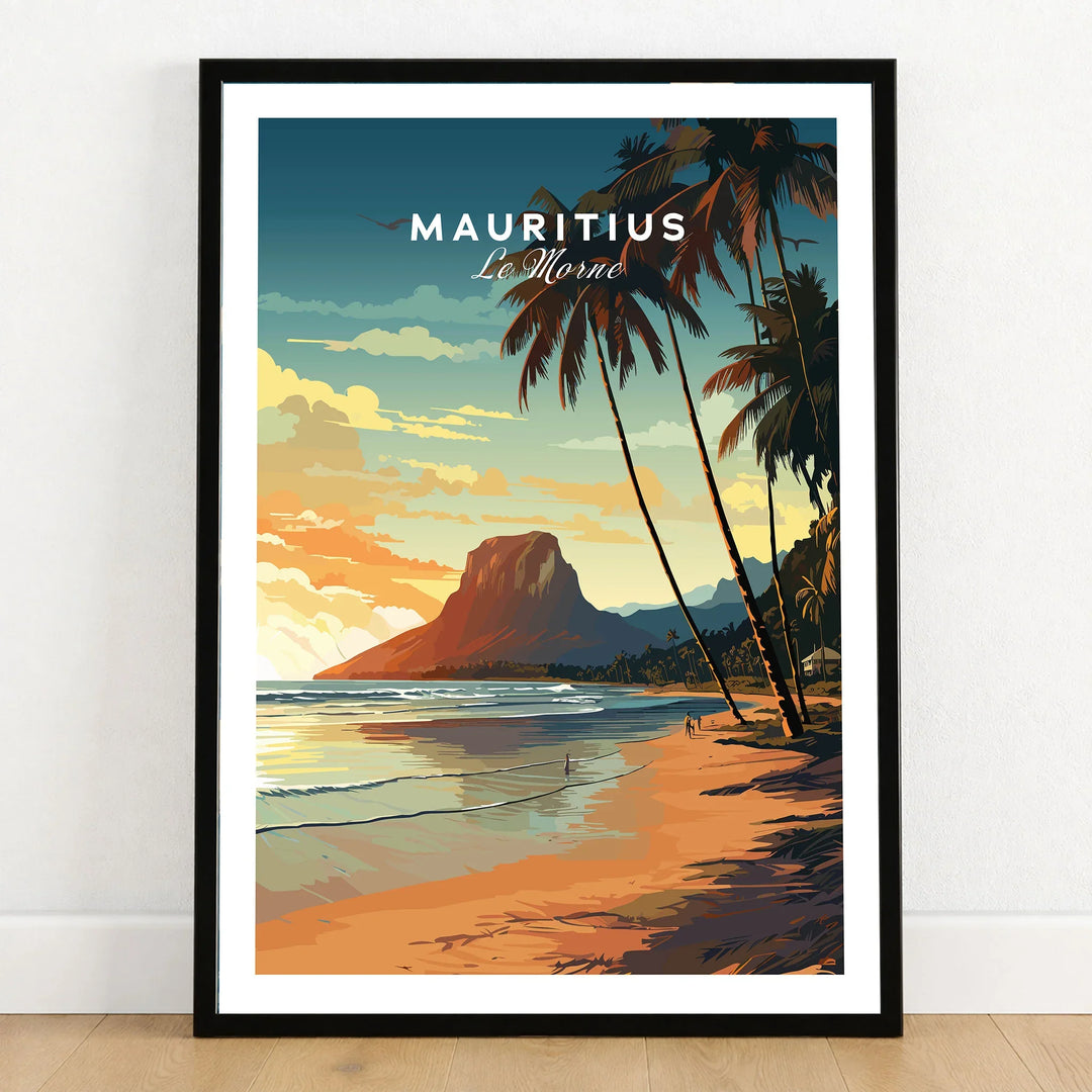 Mauritius Le Morne Poster in a black wooden frame leaning against a white wall on a light wooden floor