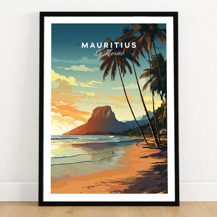 Mauritius Le Morne Poster in a black wooden frame leaning against a white wall on a light wooden floor
