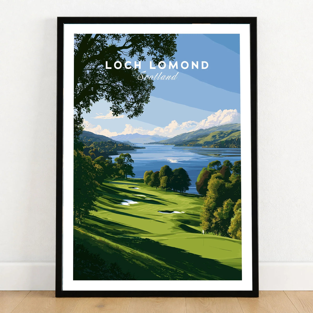 Loch Lomond Scotland Summer Shore Travel Poster — a sunlit grassy shoreline running down to Loch Lomond under old oaks, shown as art print in black frame on wooden floor