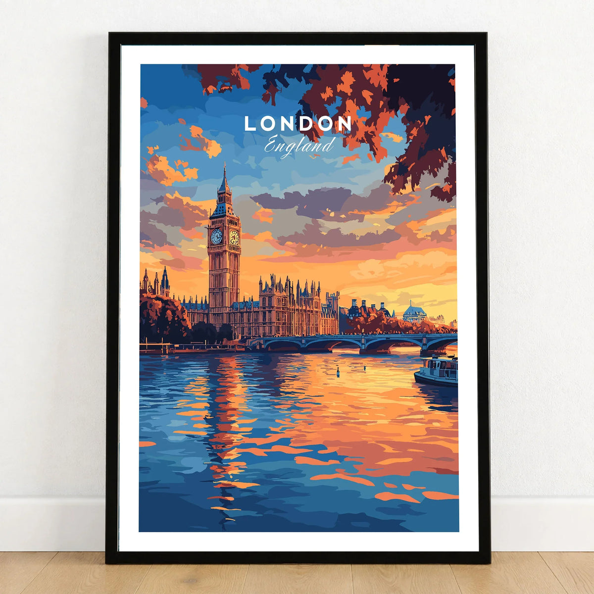 Big Ben London Art Print | Westminster Palace Poster in a black wooden frame leaning against a white wall on a light wooden floor