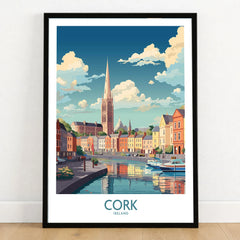 Cork Ireland Poster in a black wooden frame leaning against a white wall on a light wooden floor