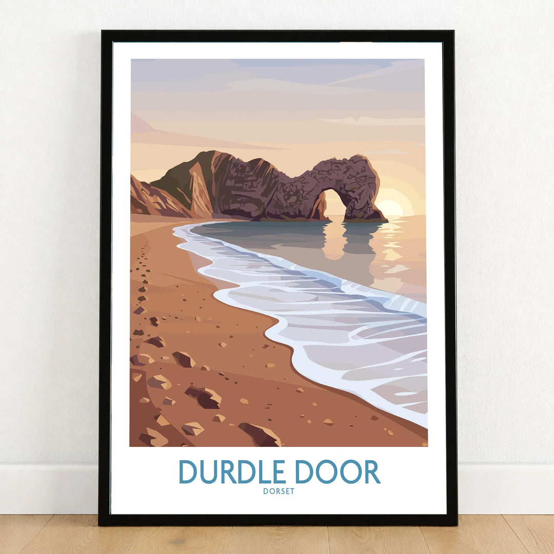 Durdle Door Dorset Wall Art – Canvas Poster in a black wooden frame leaning against a white wall on a light wooden floor