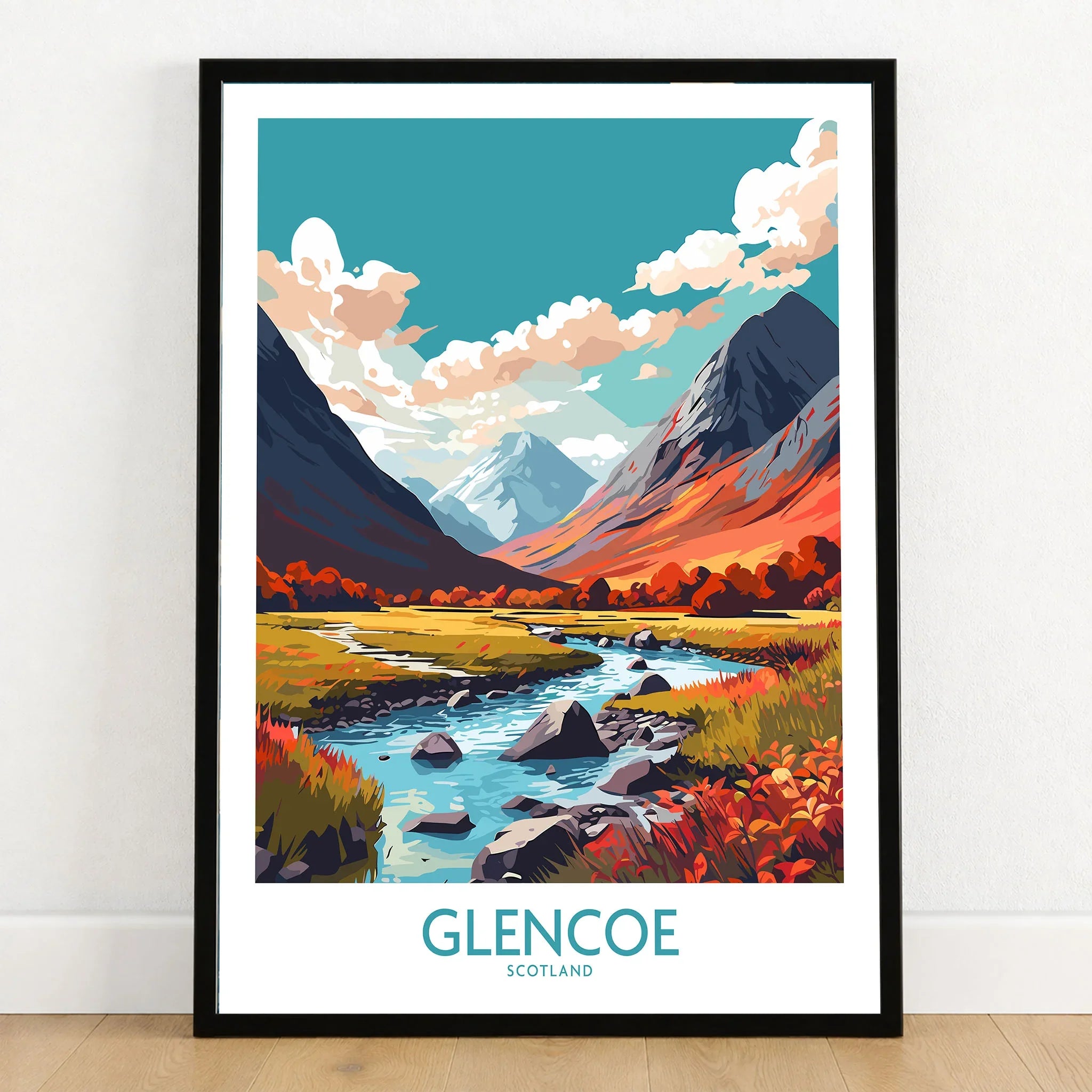 Glencoe Poster Print Modern in a black wooden frame leaning against a white wall on a light wooden floor
