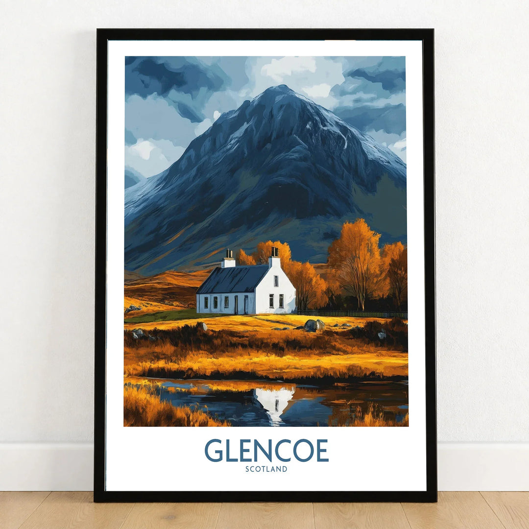 Glencoe Scotland Print in a black wooden frame leaning against a white wall on a light wooden floor