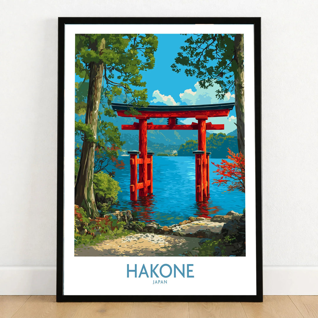 Hakone Japan Iconic Torii Print - Japanese Scenic Landscape Decor in a black wooden frame leaning against a white wall on a light wooden floor