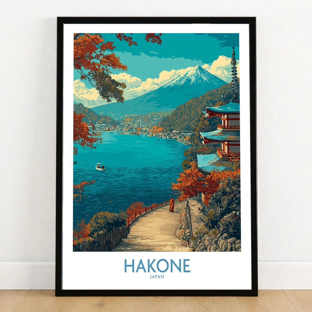 Hakone Japan Lakeside Temple Wall Art - Japanese Nature Travel Decor in a black wooden frame leaning against a white wall on a light wooden floor