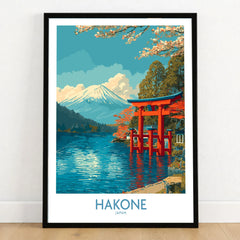 Hakone Wall Art Japan Red Torii Gate Poster in a black wooden frame leaning against a white wall on a light wooden floor