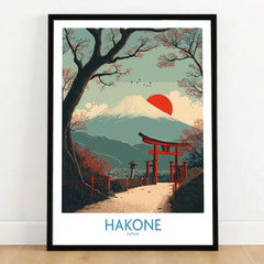 Hakone Japan Peace Gate Shrine Wall Art - Autumn Cherry Blossom Decor in a black wooden frame leaning against a white wall on a light wooden floor