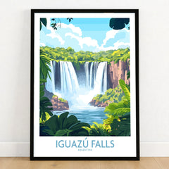 Iguazu Falls Travel Poster in a black wooden frame leaning against a white wall on a light wooden floor