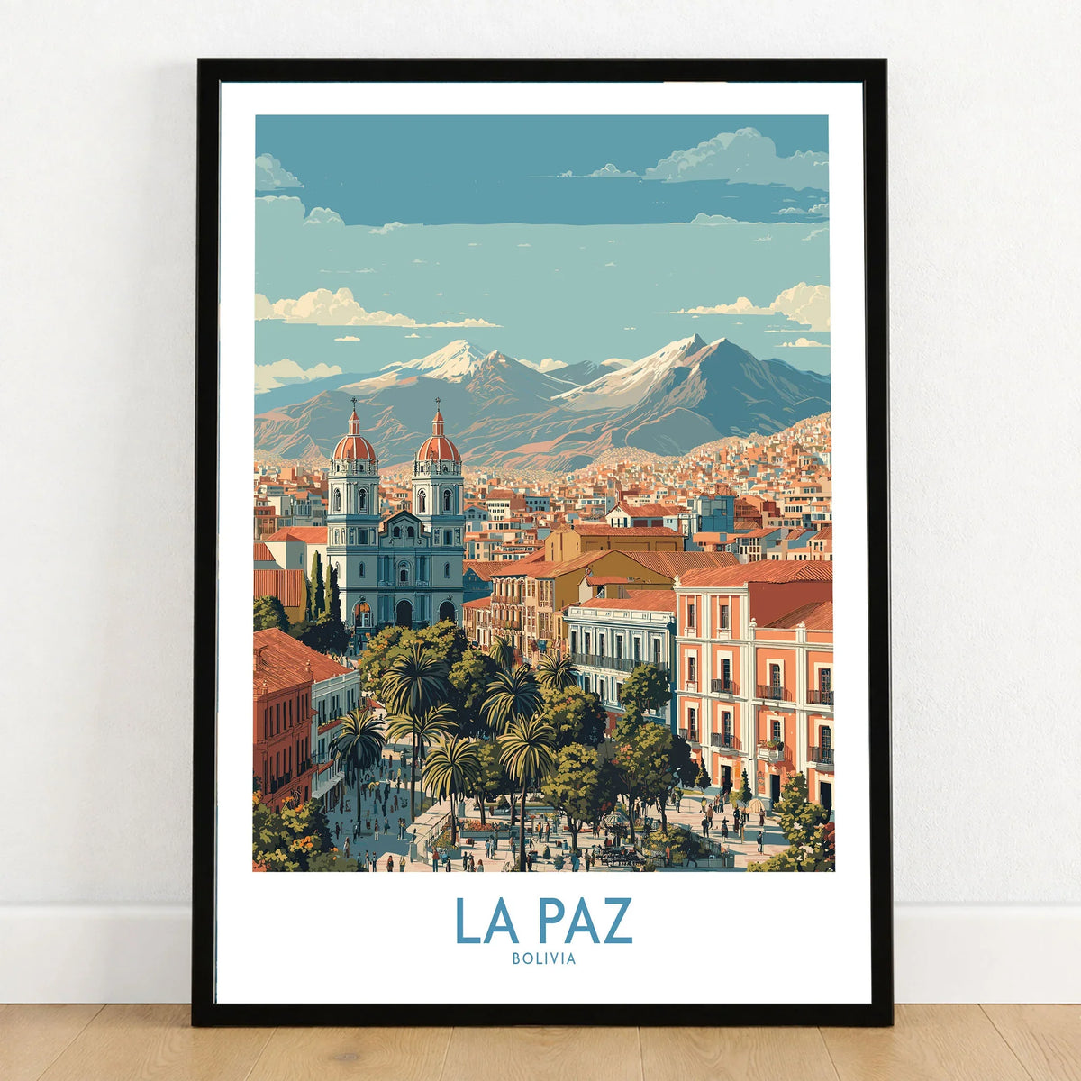 La Paz Bolivia Wall Art Poster - Bolivian Capital Travel Decor in a black wooden frame leaning against a white wall on a light wooden floor