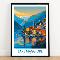 Lake Maggiore Italy Poster in a black wooden frame leaning against a white wall on a light wooden floor