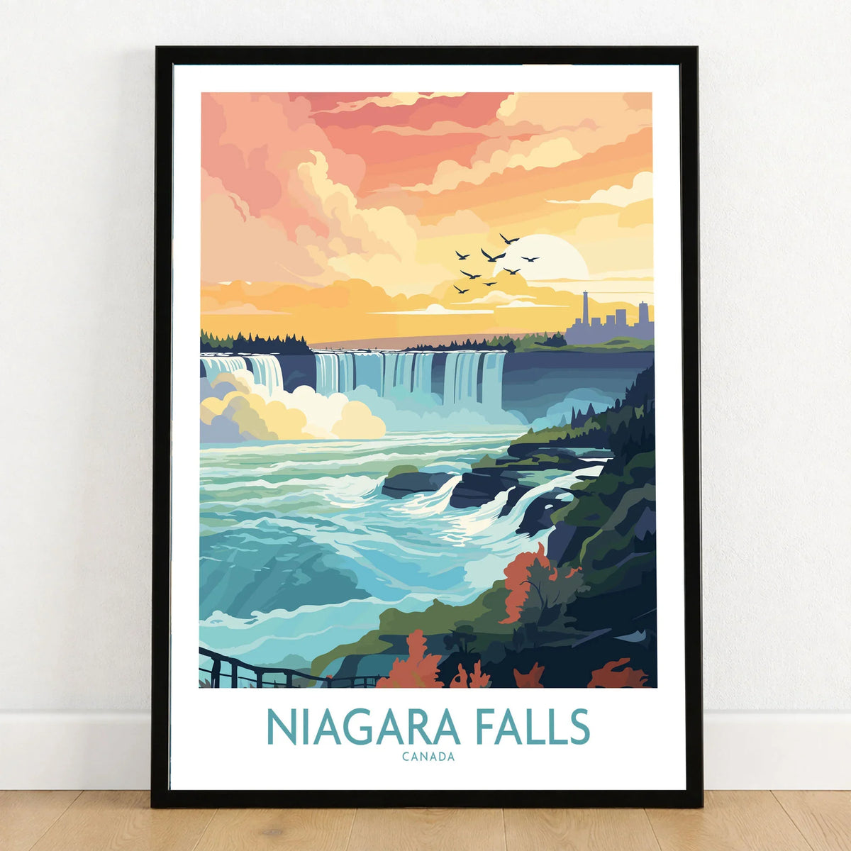 Niagara Falls Poster in a black wooden frame leaning against a white wall on a light wooden floor