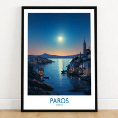Paros Poster Greece in a black wooden frame leaning against a white wall on a light wooden floor