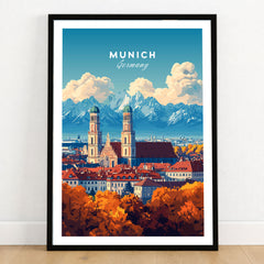 Munich Travel Print in a black wooden frame leaning against a white wall on a light wooden floor