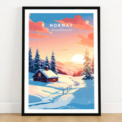 Norway Art Print in a black wooden frame leaning against a white wall on a light wooden floor