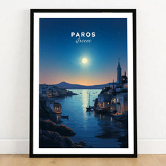 Paros Greece Print in a black wooden frame leaning against a white wall on a light wooden floor