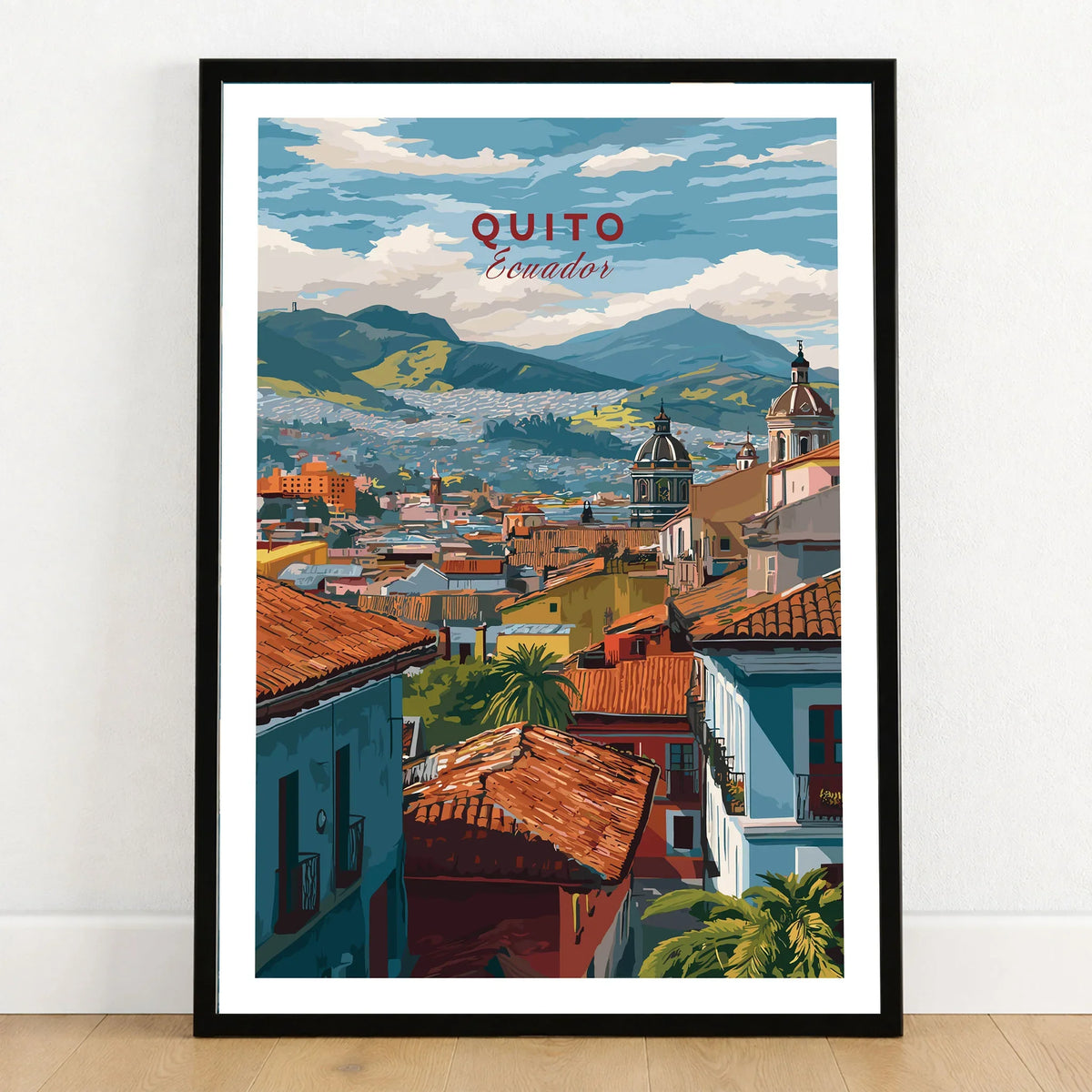 Quito Ecuador Travel Print Rooftop View Poster Cityscape Andes Hills Wall Art Decor in a black wooden frame leaning against a white wall on a light wooden floor