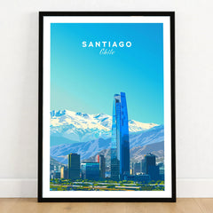 Santiago Travel Poster - Chile in a black wooden frame leaning against a white wall on a light wooden floor