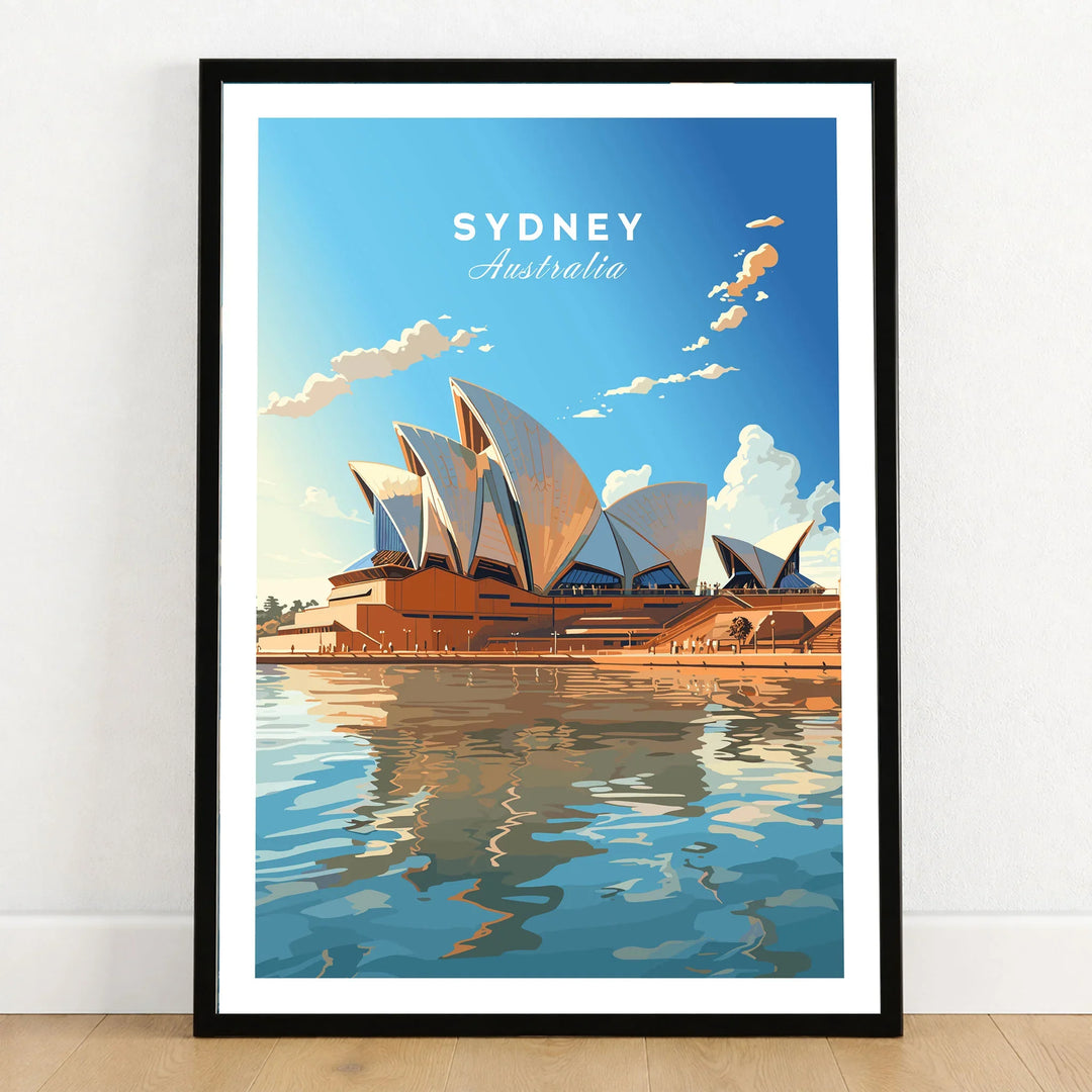 Sydney Poster Australia in a black wooden frame leaning against a white wall on a light wooden floor
