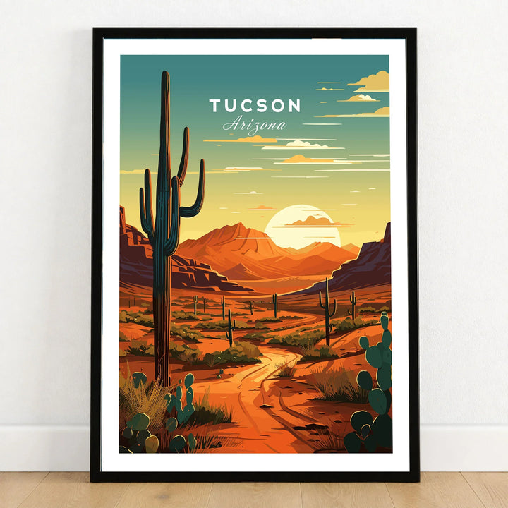 Tucson Arizona Poster in a black wooden frame leaning against a white wall on a light wooden floor